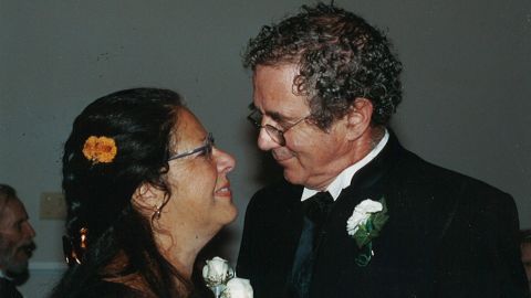 Carlo Russo, years before his ALS diagnosis, smiles with wife Karen.