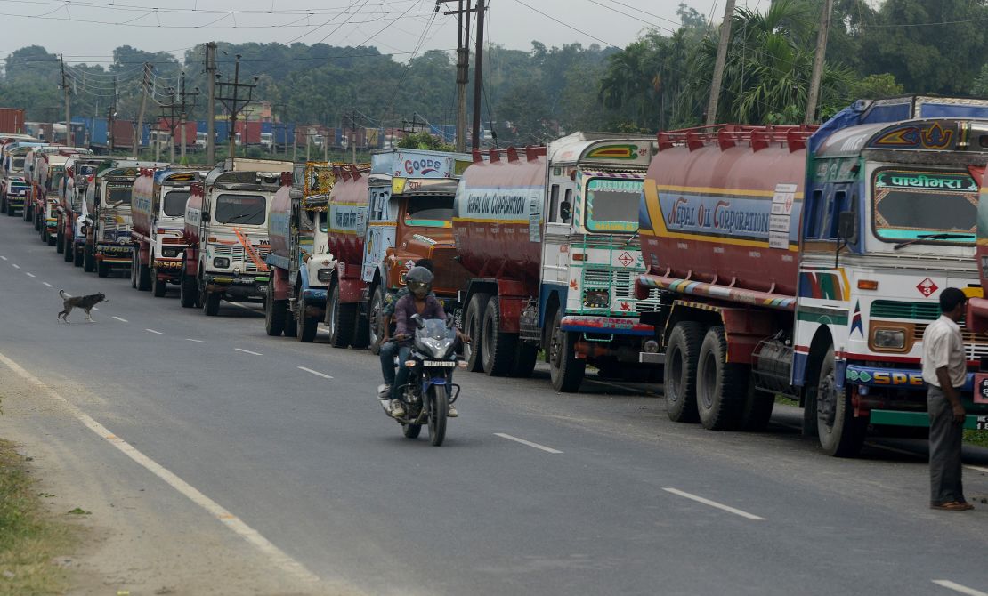 Indian trucks line up near the India-Nepal border at Panitanki on November 3, 2015. 