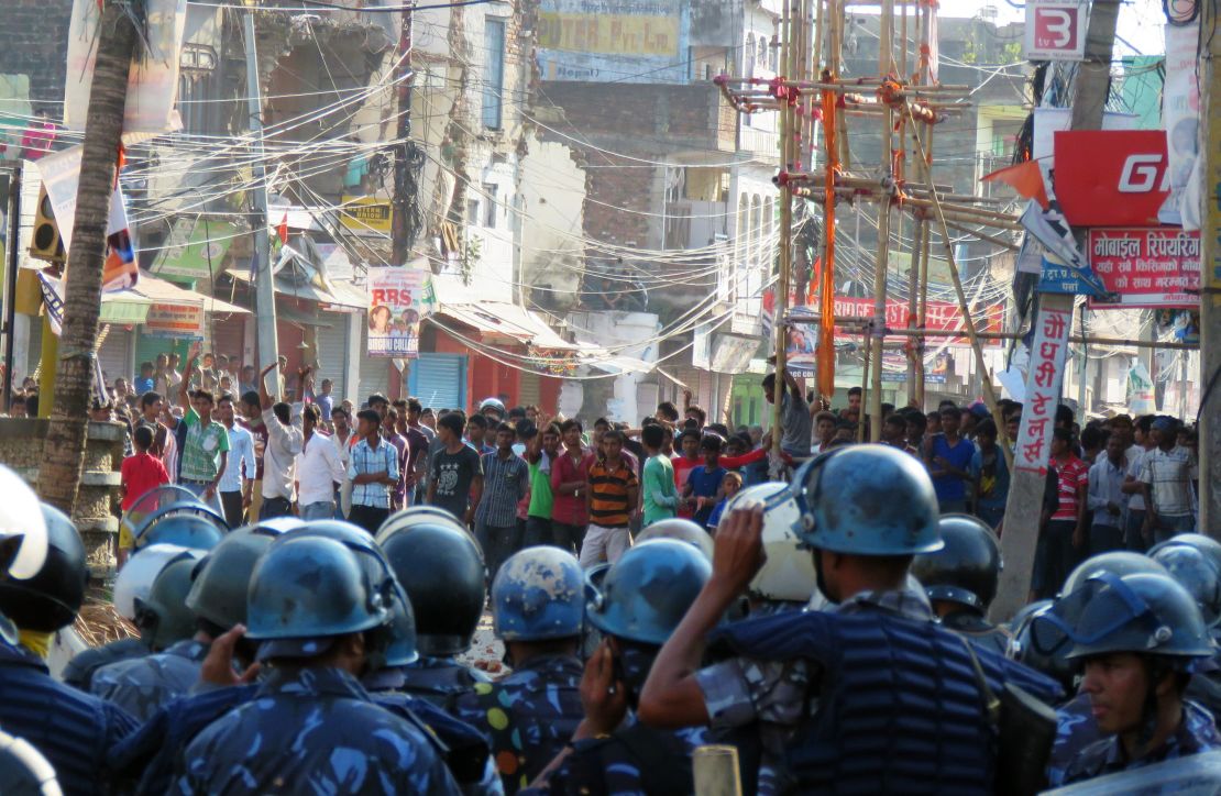 Nepalese police face off with protesters during clashes near the Nepal-India border at Birgunj, some 90 km south of Kathmandu, on November 2, 2015.