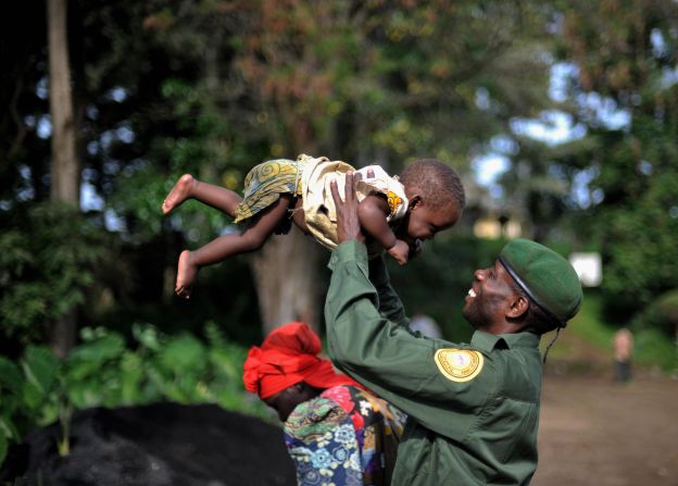  A park ranger at Virunga National Park smiles at his 9-month-old daughter.