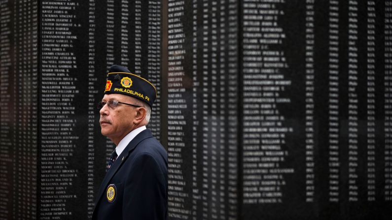 Vietnam War veteran Jose Angle Rivera pays his respects at the Korean War Memorial in Philadelphia.