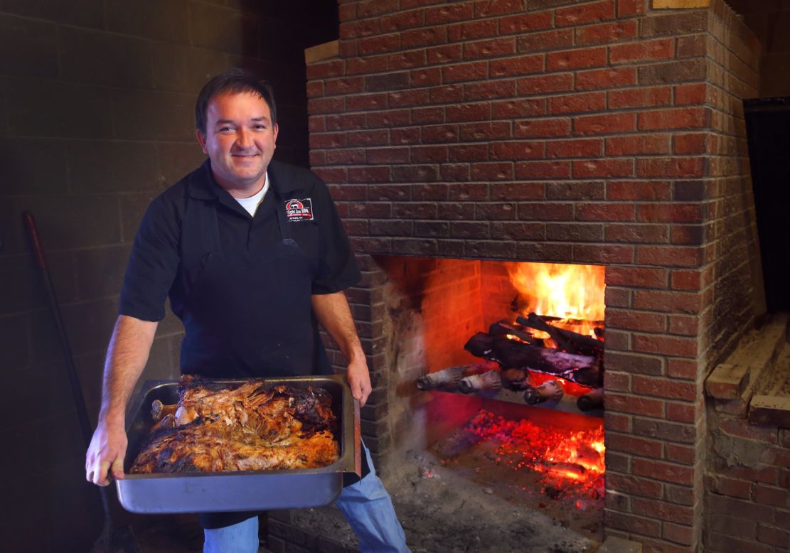 East of North Carolina's Research Triangle area -- Raleigh, Durham and Chapel Hill -- Sam Jones cooks whole hogs, Eastern-style, at the Skylight Inn in Ayden, North Carolina.