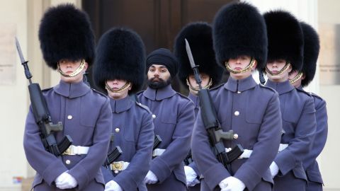 Jatenderpal Singh Bhullar is the first Sikh in the UK's Scots Guard to wear a turban on duty.