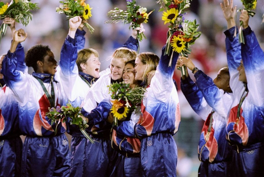 At only 18 years old she won an Olympic gold medal after helping USA defeat China 2-1 at Sanford Stadium in Athens, Georgia, in 1996.