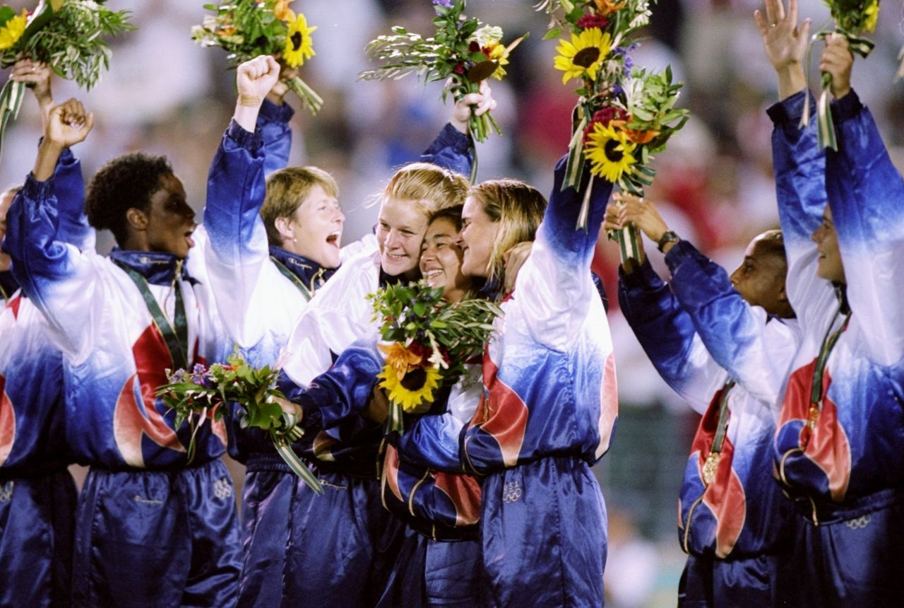 At only 18 years old she won an Olympic gold medal after helping USA defeat China 2-1 at Sanford Stadium in Athens, Georgia, in 1996.