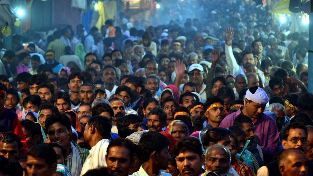 Devotees gather outside of a temple to take part in a religious procession in Chitrakoot, India, on November 11.