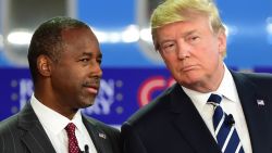 Republican presidential hopefuls Ben Carson (L) and Donald Trump look on during the Republican Presidential Debate at the Ronald Reagan Presidential Library in Simi Valley, California, September 16, 2015. Republican presidential candidates collectively turned their sights on frontrunner Donald Trump at the party's second debate, taking aim at his lack of political experience and his sometimes abrasive style. AFP PHOTO / FREDERIC J BROWN        (Photo credit should read FREDERIC J BROWN/AFP/Getty Images)