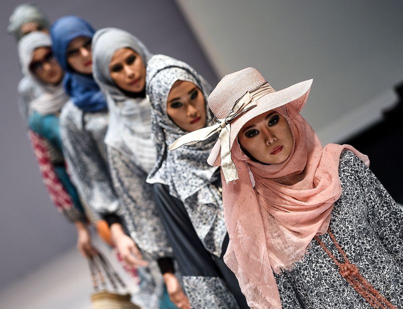 Models at the 2015 Kuala Lumpur Fashion Week are seen wearing another designer, named 'Yan's Creations', whose creations were shown off for the Islamic fashion show. 