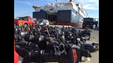 Confiscated boat motors at the customs area in Lesbos. Officers there say this is just a tiny fraction of the motors they have impounded from refugee dinghies coming to the island from Turkey.