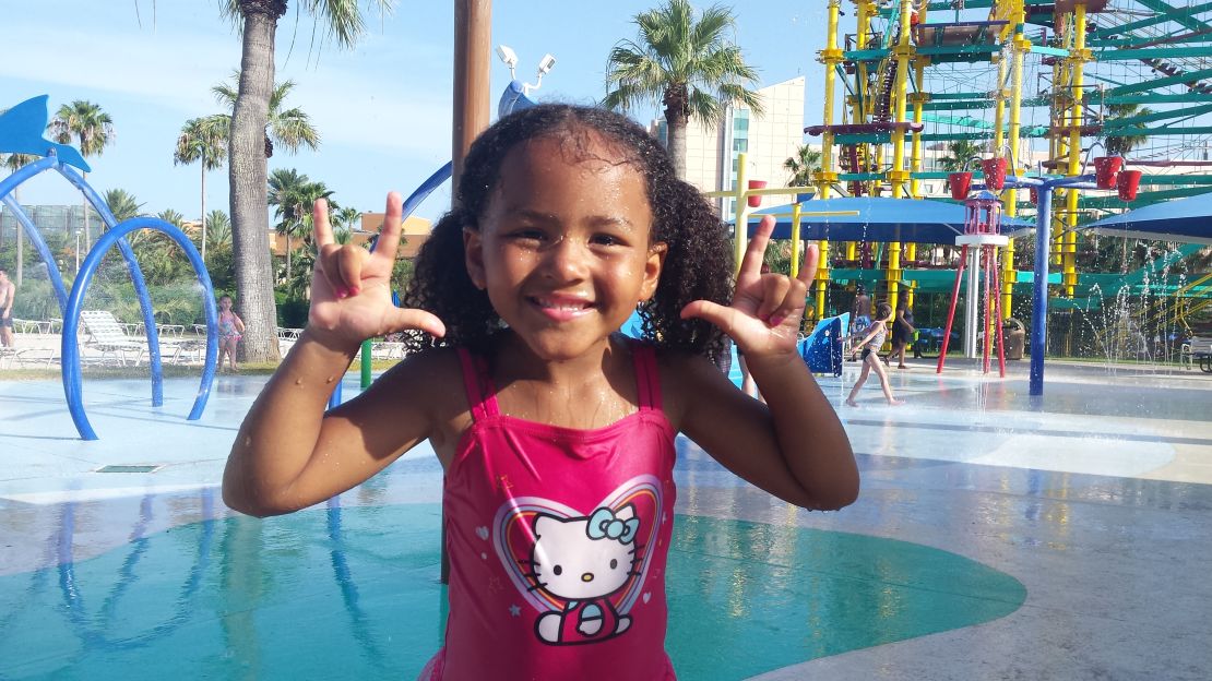 Kaylee poses for the camera at Moody Gardens in Galveston, Texas.