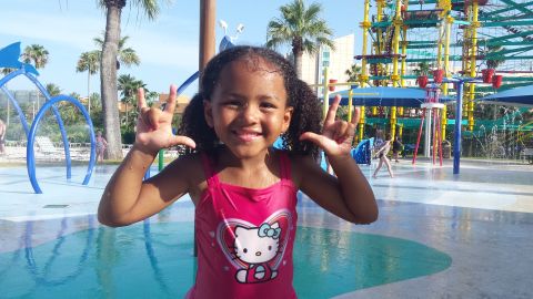 Kaylee poses for the camera at Moody Gardens in Galveston, Texas. 