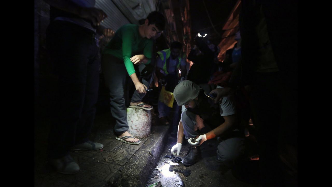 Lebanese army investigators inspect the scene.