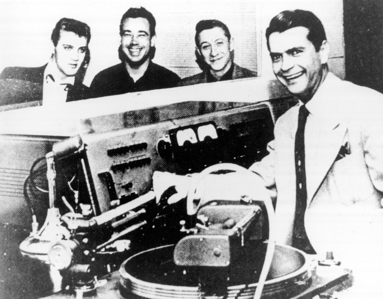 Sam Phillips, right, founded his Memphis Recording Service in 1950 and Sun Records three years later. He helped discover some of the most important talent in rock 'n' roll history, including Elvis Presley, here with Scotty Moore and Bill Black in 1954.  