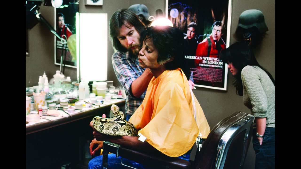 Baker didn't have much time for others on the film. The dancers weren't cast immediately, so Baker kept their zombie makeup fairly simple. "We'd only have three days from meeting the dancers to finishing their faces," he said. But Jackson was well cared-for. In this photo, Jackson holds Muscles, his pet boa constrictor.