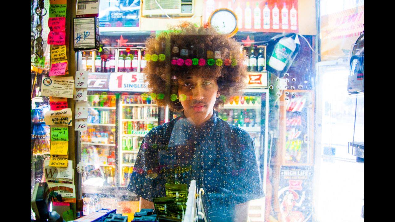 For 15 years, Hatnim Lee has been photographing customers at her parents' liquor store in Washington. She calls her portrait series "Plexiglass."
