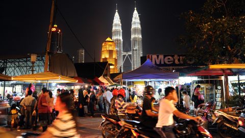 A view of Malaysia's landmark Petronas Twin Towers shortly before lights are switched off for Earth Hour in Kuala Lumpur on March 27, 2010. 