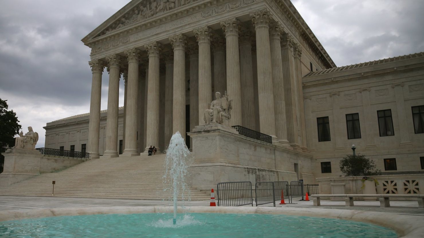 A fountain flows in front of the Supreme Court Building, August 20, 2014 in Washington, DC.