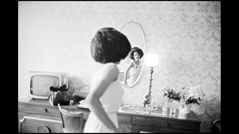Ross looks at a mirror in a hotel room at the Apollo Theater. "I didn't know them as performers, I knew them as people, as human beings. ... I didn't know about their fame, I just knew them before the camera," Davidson said. "I was comfortable with them, and they were comfortable with me."