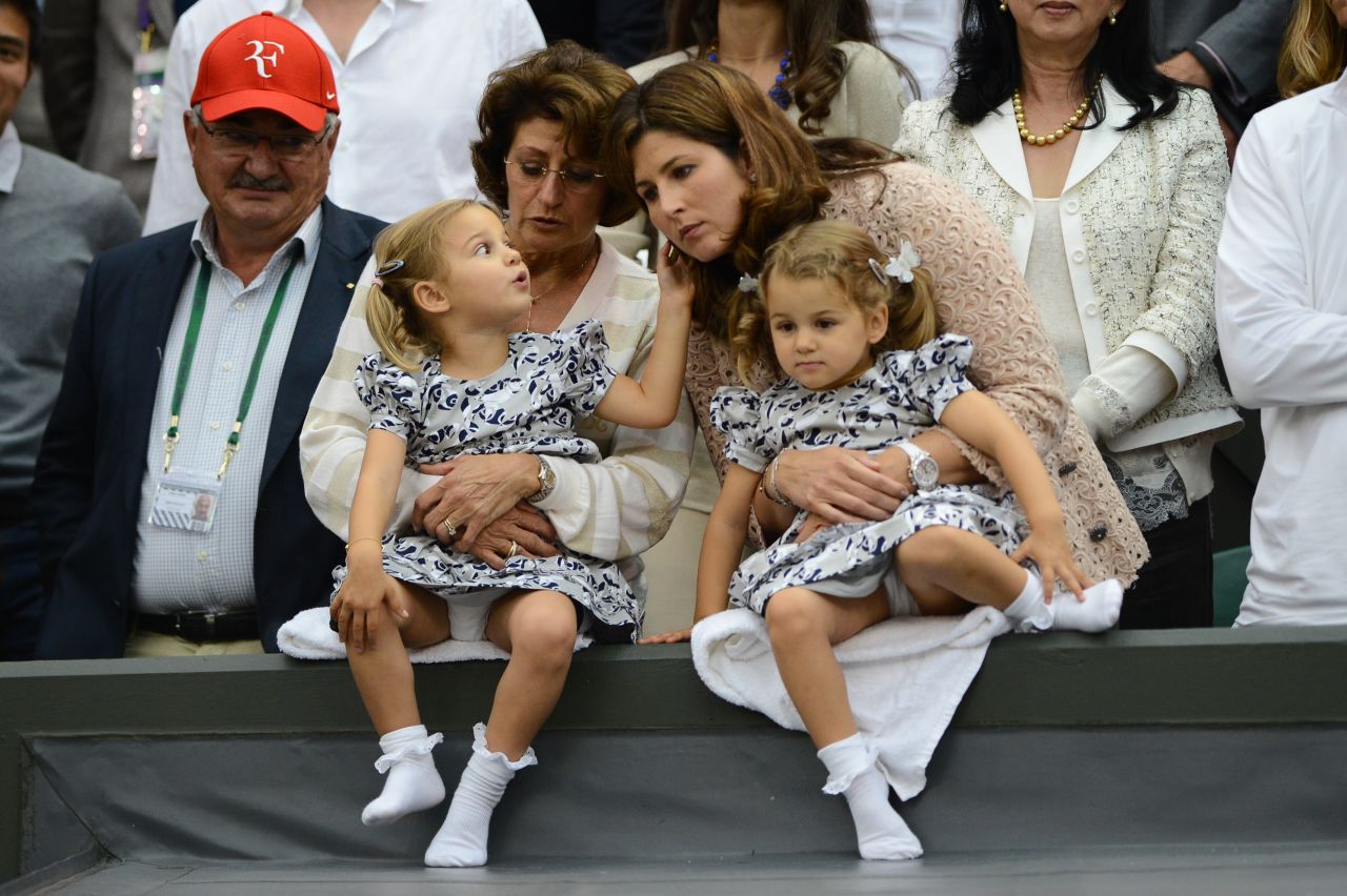 Roger Federer's wife Mirka is among the high-profile WAGs (Wives and Girlfriends of players) seen in the stands. She is pictured here with their twin daughters in 2012. 