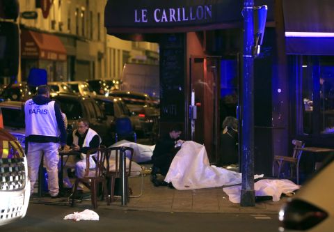 Victims lay on the pavement outside a Paris restaurant.