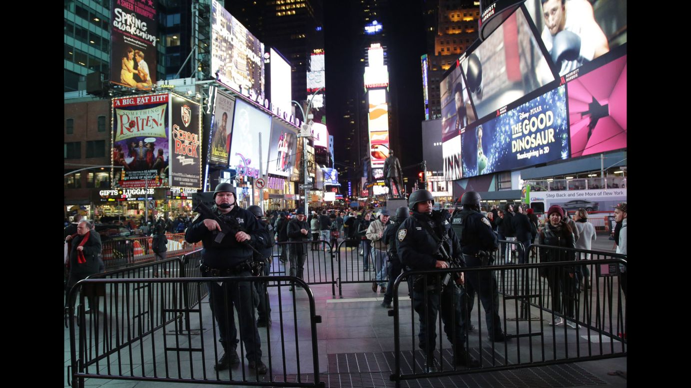 Police show a heightened presence in Times Square in New York on November 13,  following the terrorist attacks in Paris. 