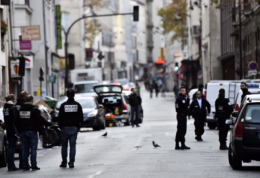 Police are out in force November 14 near La Belle Equipe, one of the sites of the terror attacks.