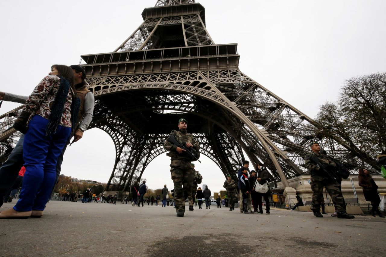 Soldiers patrol the Eiffel Tower on November 14.
