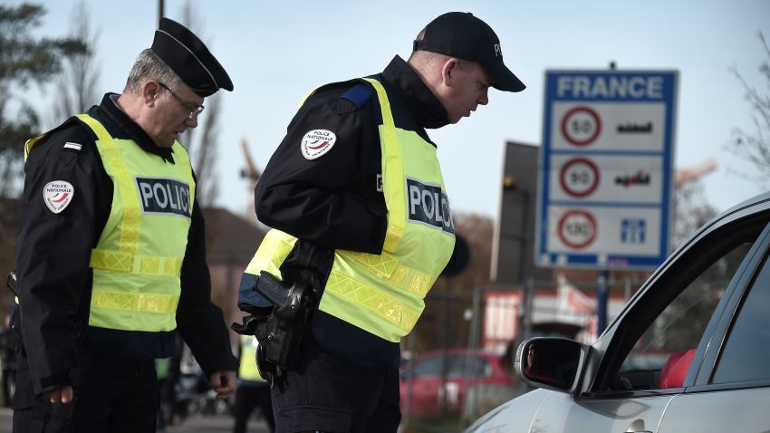 French Police officers carry out checks on vehicles on the "European bridge," between Strasbourg and Kehl, on November 14,  as part of security measures in the wake of attacks in and around Paris. 