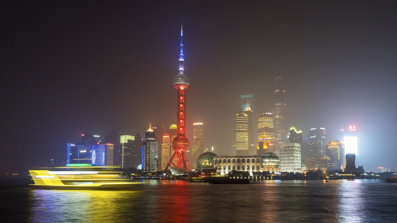 A ferry travels past the Oriental Pearl Tower in Shanghai, China, on November 14. 