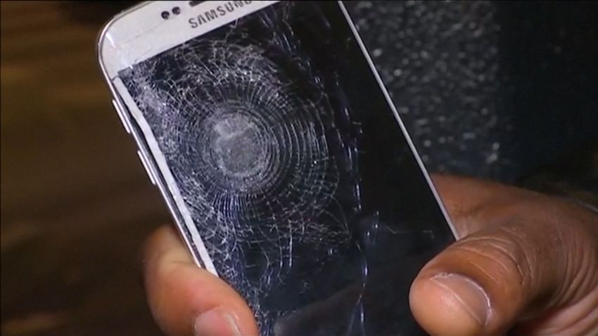 paris attack survivor cell phone saved shrapnel sot_00000000.jpg