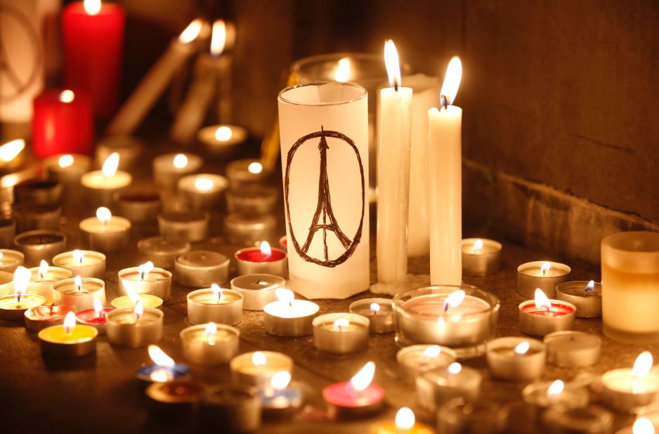 Candles are lit in Hong Kong on November 14 to remember the scores who died in France.