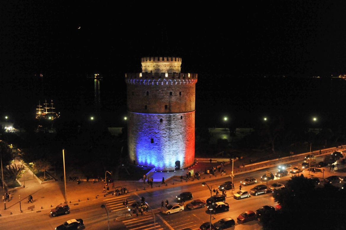 The White Tower, a symbol of the Greek city of Thessaloniki, is lit with the colors of the French national flag on November 14.