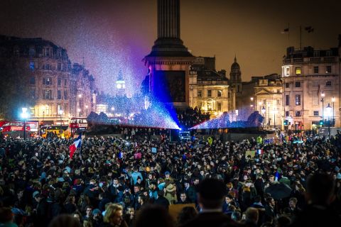 Thousands gather in London's Trafalgar Square for a candlelit vigil on November 14 to honor the victims of the Paris attacks. 