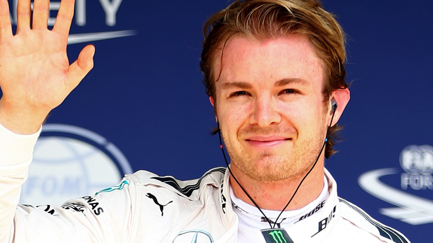 Nico Rosberg of Germany and Mercedes celebrates his fifth straight pole of the F1 season.