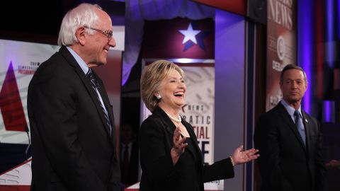 From left, Democratic presidential candidates Bernie Sanders, Hillary Clinton and Martin O'Malley prepare to debate at Drake University in Des Moines, Iowa, on Saturday, November 14. It was the party's second presidential debate.