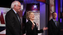 From left, Democratic presidential candidates Bernie Sanders, Hillary Clinton and Martin O'Malley take the debate stage at Drake University in Des Moines, Iowa, on Satuday, November 14 . It was the party's second presidential debate.