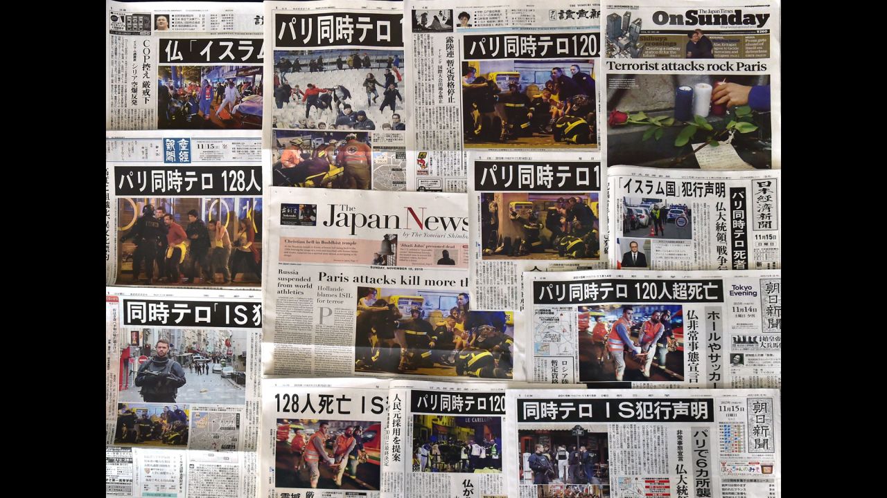 Front pages of Japanese newspapers in Tokyo show coverage and photos of the Paris attacks on November 14.