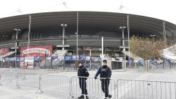 Police secure the area outside the Stade de France stadium, on the outskirts of Paris, on November 14, 2015. Three loud explosions were heard outside France's national stadium during the first half of a friendly international football match between France and Germany. At least four people died outside the glittering venue which staged the 1998 World Cup final with several others seriously hurt. Some128 people were killed in the Paris attacks on November 13 evening, with 180 people injured, 80 of them seriously, police sources told AFP. AFP PHOTO / MIGUEL MEDINA        (Photo credit should read MIGUEL MEDINA/AFP/Getty Images)