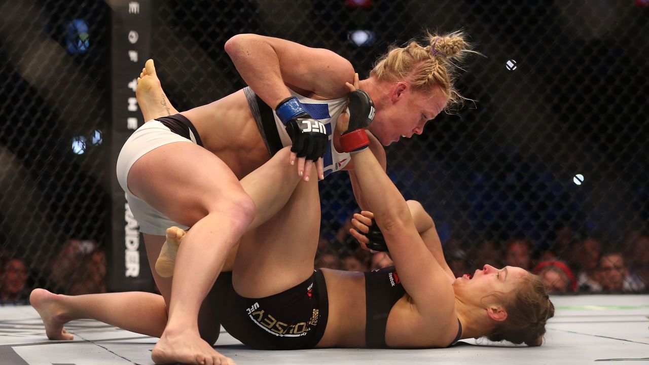 MELBOURNE, AUSTRALIA - NOVEMBER 15:  Ronda Rousey of the United States (R) and Holly Holm of the United States compete in their UFC women's bantamweight championship bout during the UFC 193 event at Etihad Stadium on November 15, 2015 in Melbourne, Australia.  (Photo by Quinn Rooney/Getty Images)