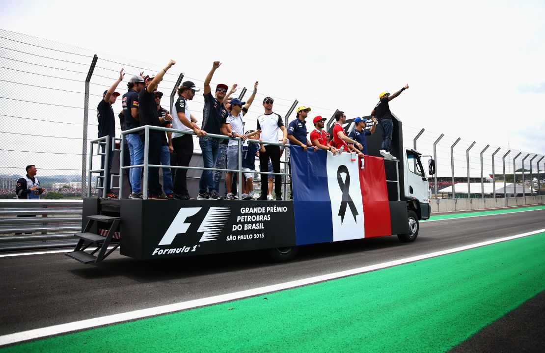F1 drivers honor the victims of the terrorist attacks in Paris prior to the 2015 F1 Grand Prix of Brazil.