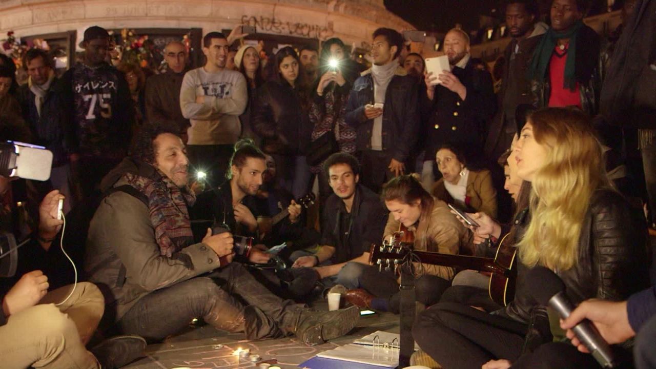 paris terror attack vigil crowd sings hallelujah_00001323.jpg