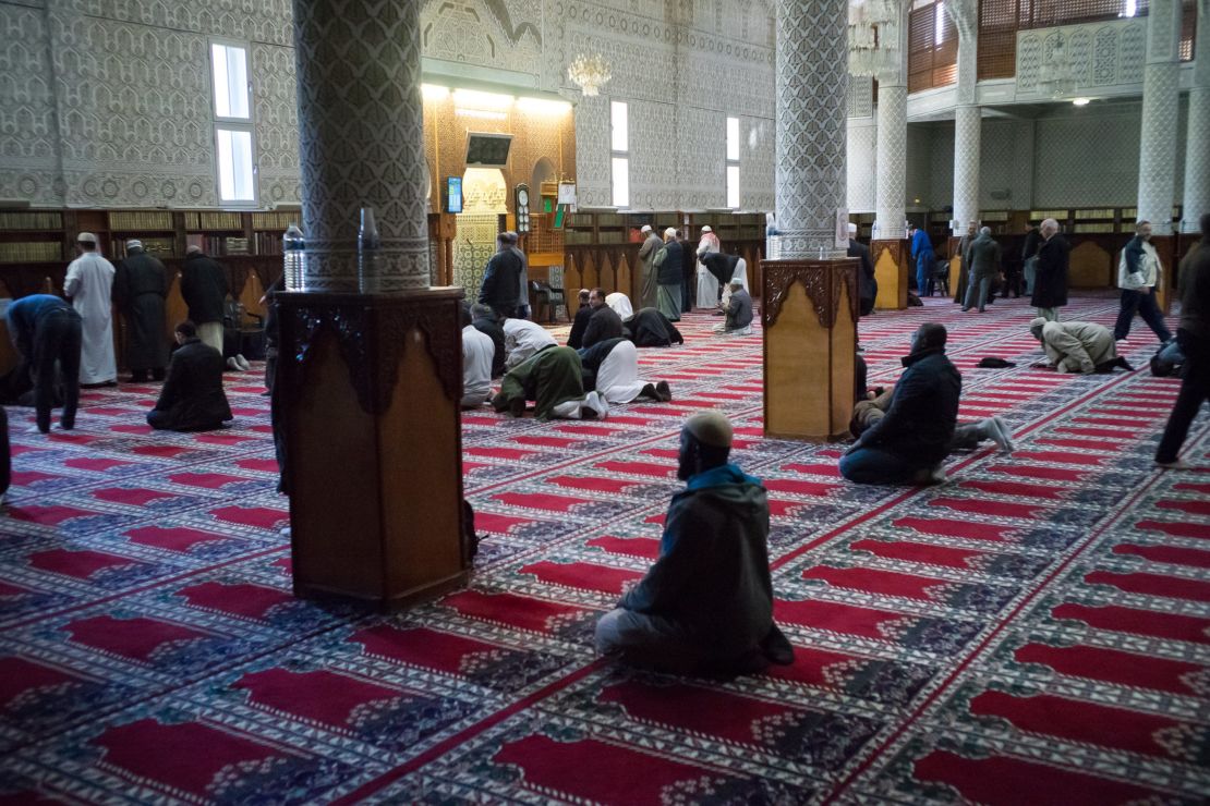 Men pray at the Courcouronnes mosque (Mosquee Evry Courcouronnes).