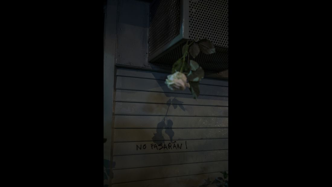 "No passaran!" is scrawled on a wall near the Bataclan music venue on November 15. The phrase translates roughly to "thou shall not pass" and refers to standing firm in the face of an enemy. 