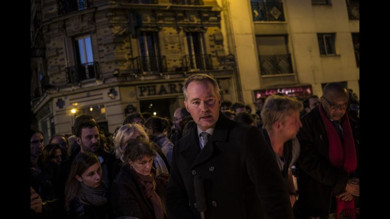 People walk down Rue Charonne on November 15, near the site of one of the attacks. 