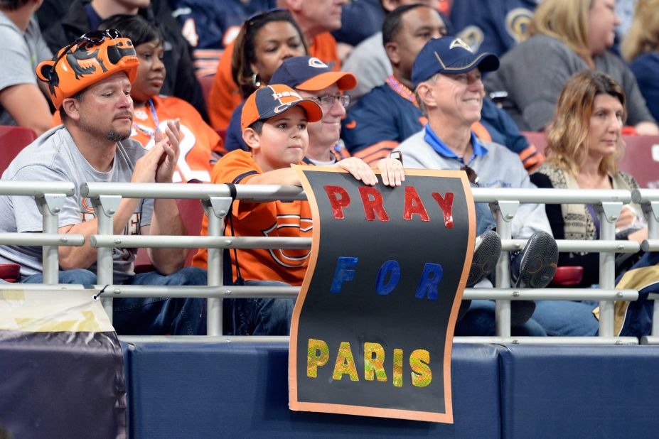 A young fan displays a sign NFL match between the Chicago Bears and the St. Louis Rams at the Edward Jones Dome on Sunday.