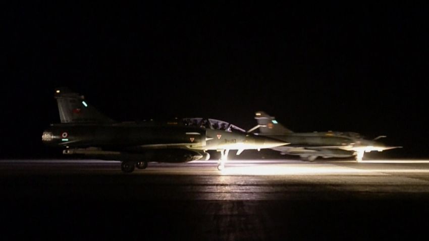 This image made from video released by the French Army Communications Audiovisual office (ECPAD) shows French army jets taking off from a site in Jordan to strike at Islamic State group targets Sunday, Nov. 15, 2015. France launched "massive" air strikes on the Islamic State group's de-facto capital in Syria Sunday night, destroying a jihadi training camp and a munitions dump in the city of Raqqa, where Iraqi intelligence officials say the attacks on Paris were planned. (ECPAD/APTN via AP) THIS IMAGE MAY ONLY BE USED FOR 30 DAYS FROM TIME TRANSMISSION; NO ARCHIVING; NO LICENSING; MANDATORY CREDIT