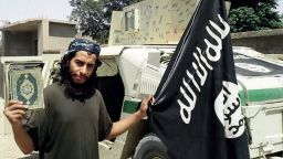 This undated image made available in the Islamic State's English-language magazine Dabiq, shows Abdelhamid Abaaoud. Abaaoud, the child of Moroccan immigrants who grew up in the Belgian capitals Molenbeek-Saint-Jean neighborhood, was identified by French authorities on Monday Nov. 16, 2015, as the presumed mastermind of the terror attacks last Friday in Paris that killed over a hundred people and injured hundreds more. (Militant Photo via AP)