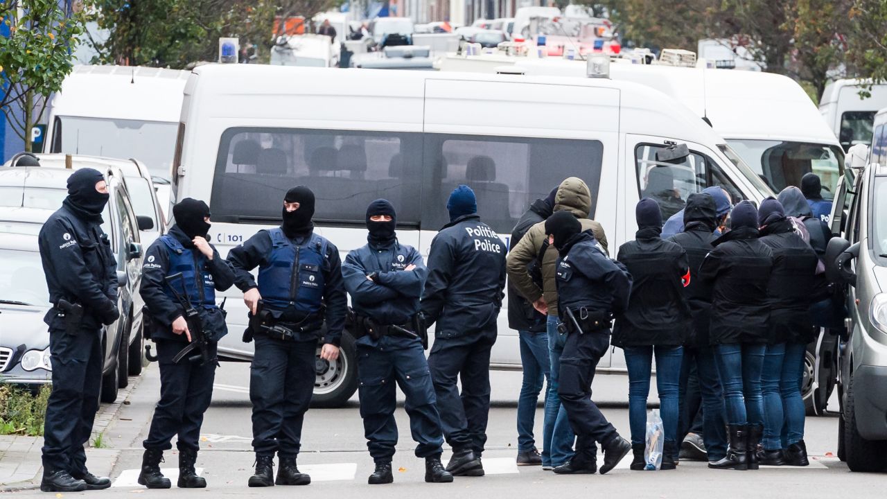 Armed police guard a street in Brussels on November 16.