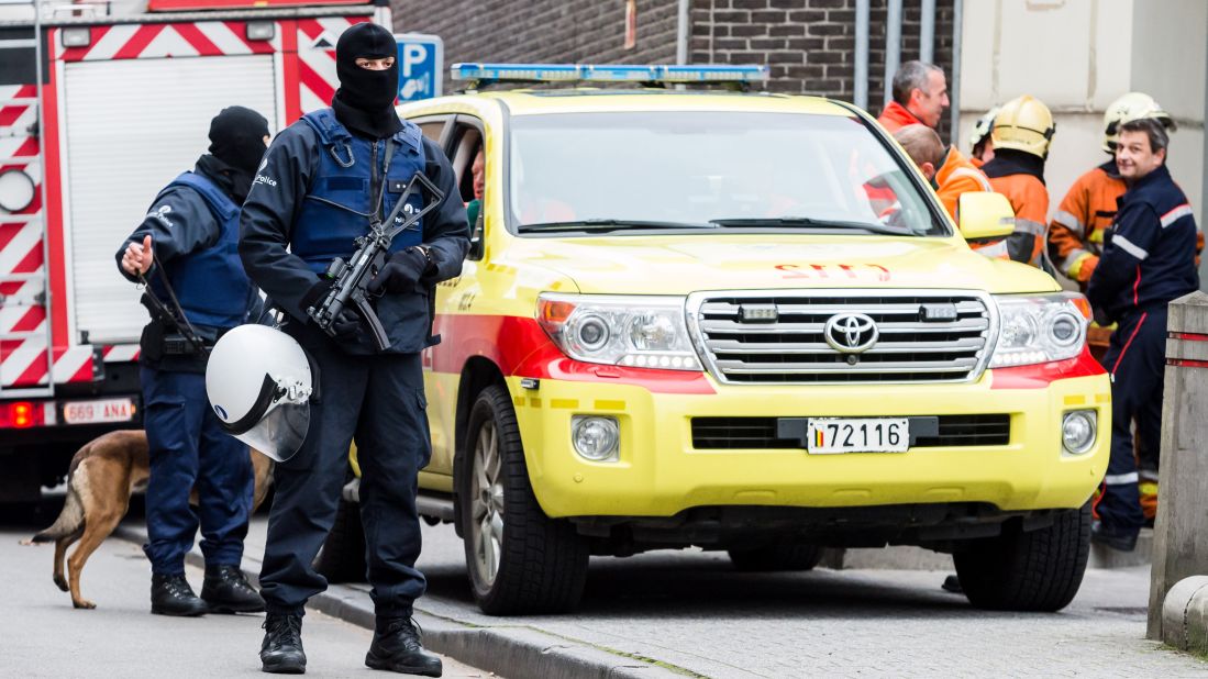 Armed police guard a street in Molenbeek on November 16.