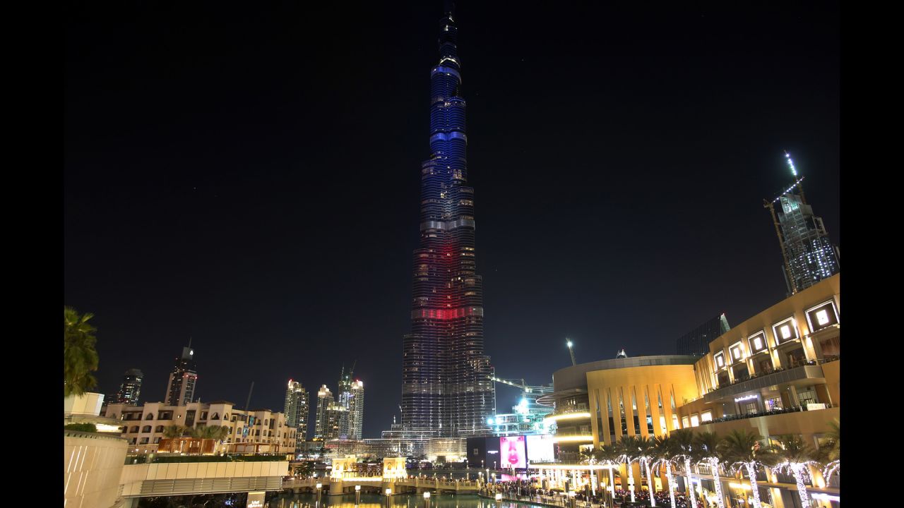 The world's tallest tower, Burj Khalifa, is lit in French colors Sunday, November 15 in Dubai, United Arab Emirates.
